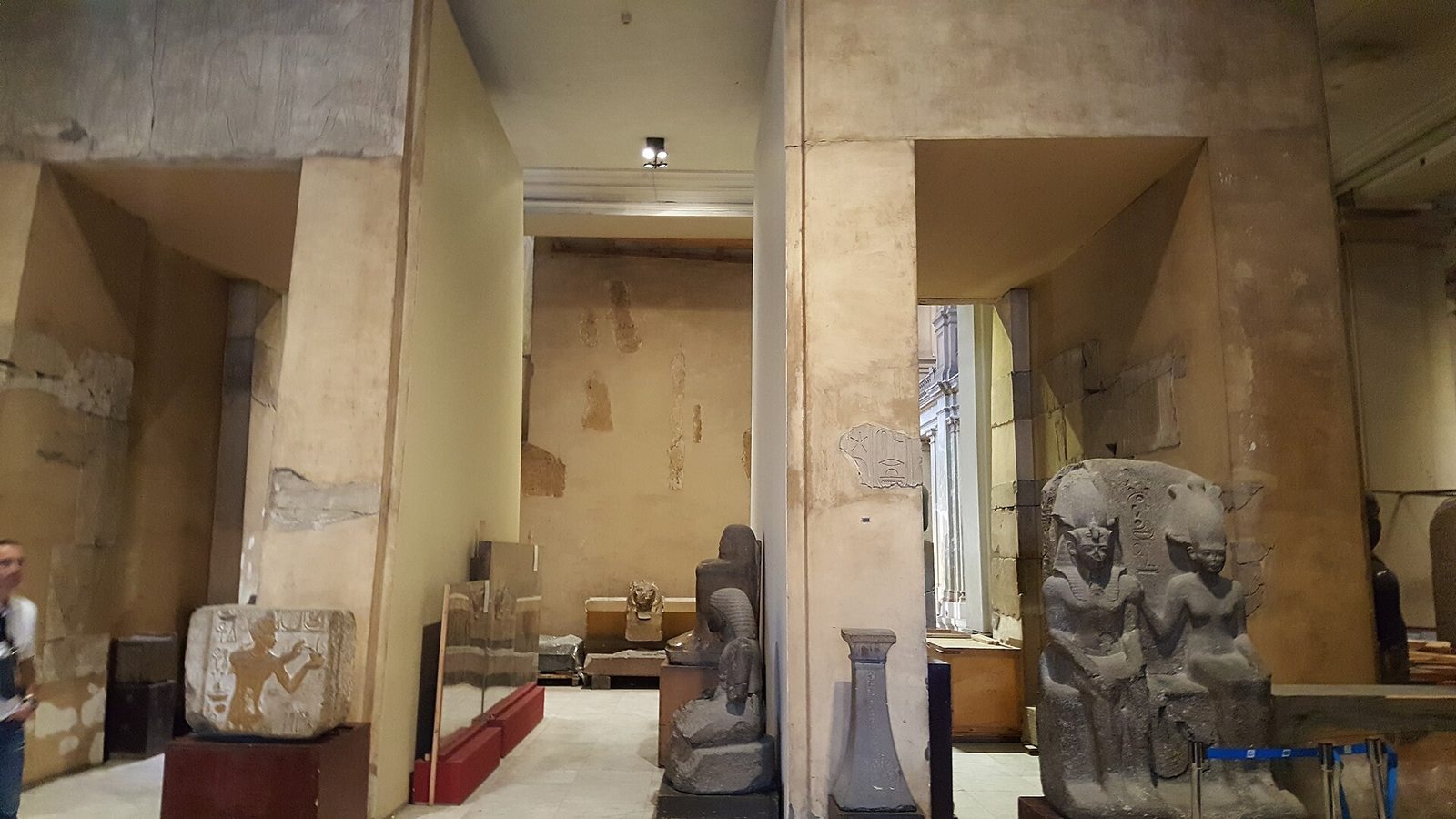 Egyptian Museum gallery with objects displayed at different heights